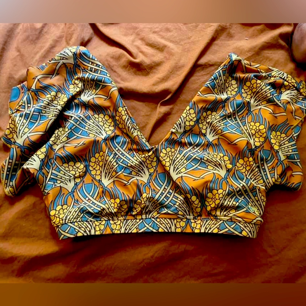Albion bathing suit including cape crop and  skirt size L golden hour print